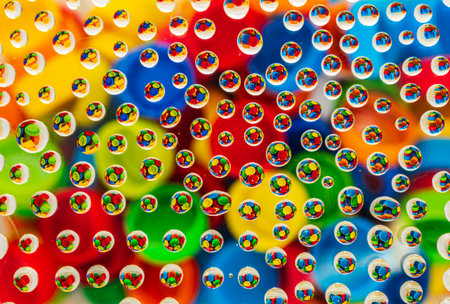 water drop reflected from the surface on which form circles beautifulの写真素材