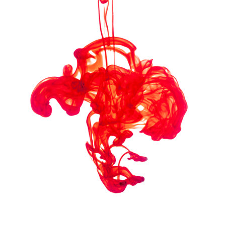 Color drop in water, photographed in motion. Ink swirling in water.の写真素材