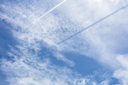 The sky with a beautiful white cloud is moving with the wind.の写真素材