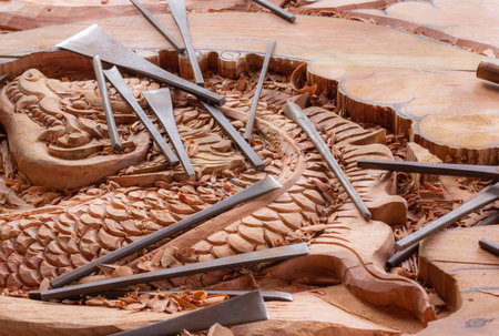 A collection of artisan tools, sculpting on real workspaces, ready for immediate use.の写真素材