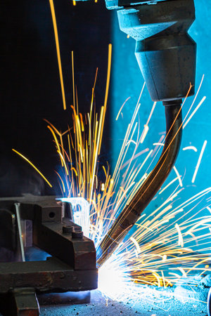 The movement of the robot welding in an auto parts factory.の写真素材