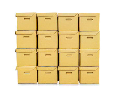 Brown paper boxes overlaid on a white backgroundの写真素材