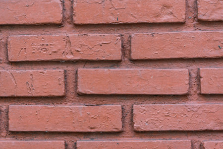 Red brick wall is strong and stable.