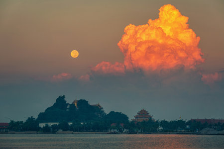 Super blood moon over the temple on the famous place of Chonburi Thailand called Koh Loy. night scene shotの写真素材