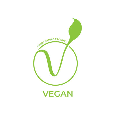 Vegan calligraphy logo with green leaves for organic food. Vegan vegetarian design symbol typography logoのイラスト素材
