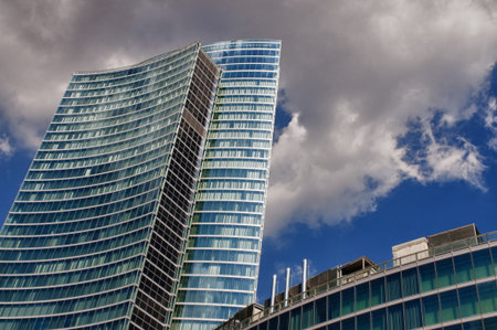 Skyscraper of the Lombardy Region dipped between clouds