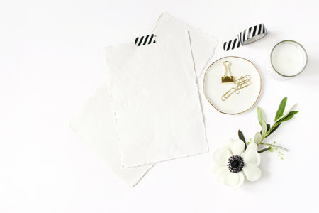 Wedding, birthday desktop mock-up scene. Blank cotton paper greeting cards, washi tape and golden...