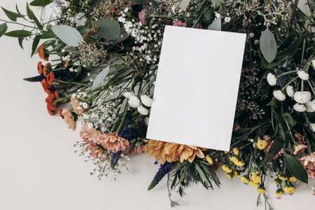 Moody feminine wedding, birthday mockup scene. Blank paper greeting card, invitation on floral...