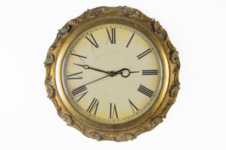 Clock face of historical wall clock with golden frameの写真素材