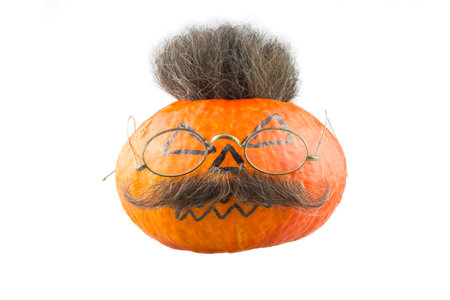 Halloween pumpkin with hair and moustacheの写真素材
