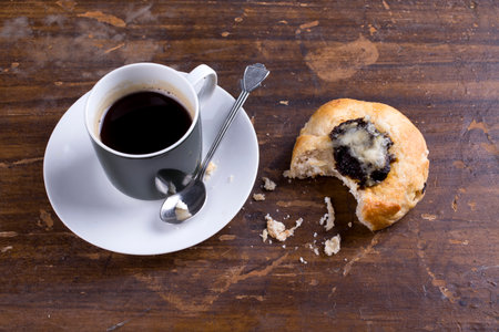Traditional czech homemade pie and a cup of coffee on a wooden tableの写真素材