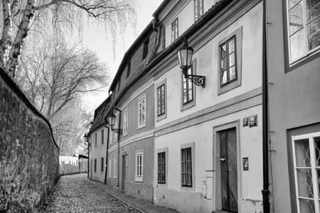 Historical lane in prague quarter Novy svet, black and white photoの写真素材