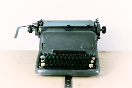 Old retro typewriter on the table, vintage style