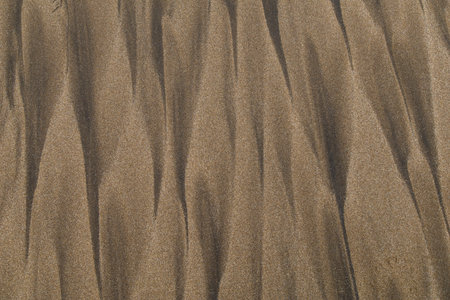 Sand on a beach as a background