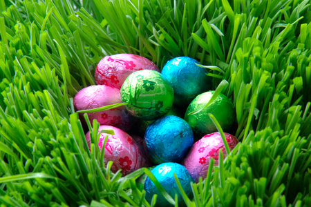 Easter eggs made of chocolate lying on the grass