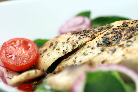 Grilled chicken breast  tomatoes , spinach, onions and mushrooms   perfect mediterranean meal  の写真素材
