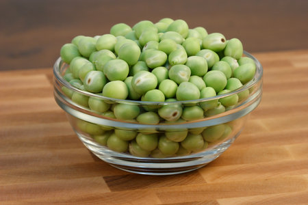 green beans  on fine wood cutting board with wood  background  の写真素材