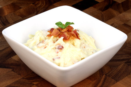 Gourmet exquisite carbonara pasta plate made with fancy organic bacon, eggs, heavy cream, and  parmesan cheese  の写真素材