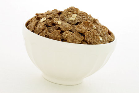 Delicious and nutritious bran flakes cereal, high in bran, high in fiber, served in a beautiful ...