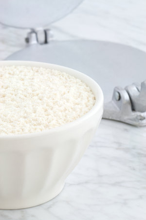 nixtamalized mexican corn flour on carrara marble pastry boardの写真素材