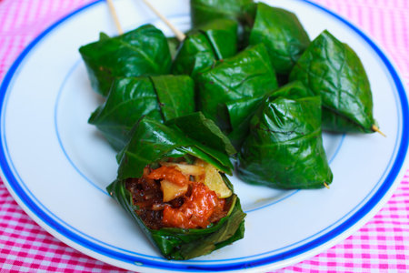 Food wrapped in leaves,A nutritious snack in Thailand.の写真素材