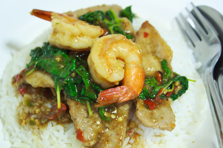 Spicy basil shrimp and pork Fried with rice, Thai food.の写真素材