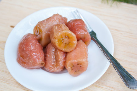 Thai style boiled bananas in syrup.の写真素材