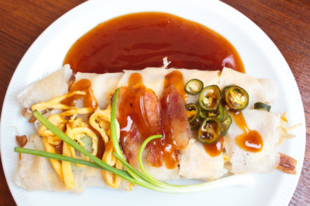 fresh spring rolls with vegetables and sweet sauce.
