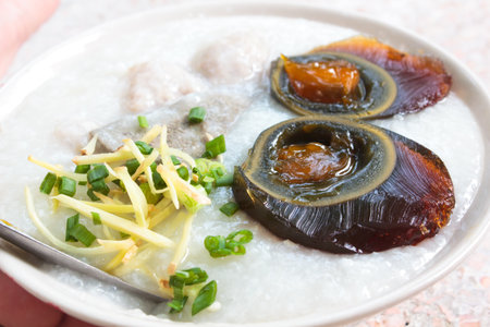 porridge with century egg or preserved duck eggs, traditional chinese の写真素材