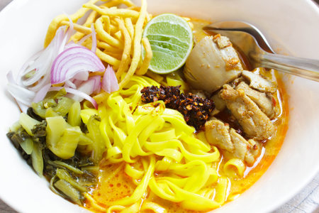 northern thai noodle curry soup, khao soi traditional thai food.の写真素材