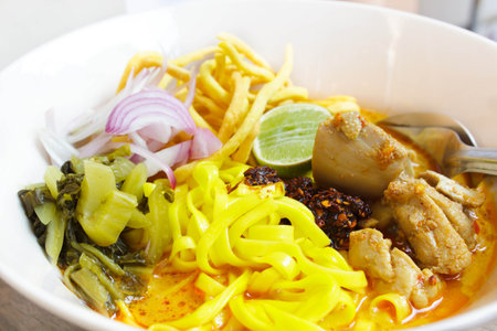 northern thai noodle curry soup, khao soi traditional thai food.の写真素材