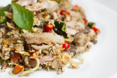 spicy mackerel salad with mix fresh vegetable, thai food.の写真素材