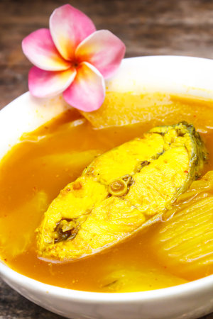 Hot and sour with fish and papaya, delicious thai traditional food.の写真素材