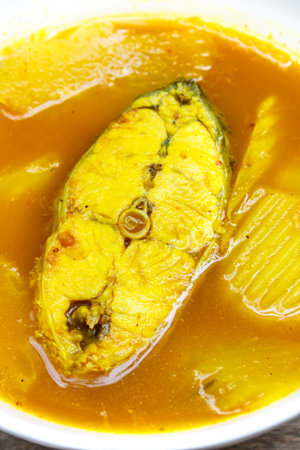 Hot and sour with fish and papaya, delicious thai traditional food.の写真素材