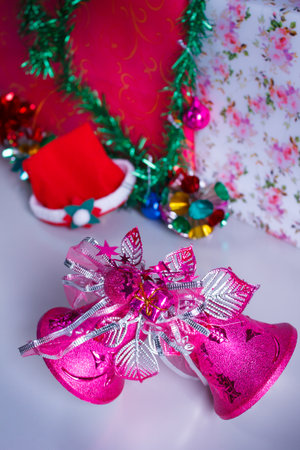 Pink christmas decoration bells in the party.の写真素材