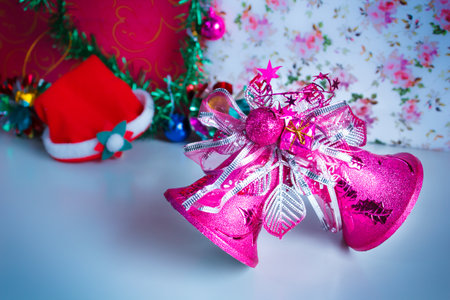Pink christmas decoration bells in the party.の写真素材