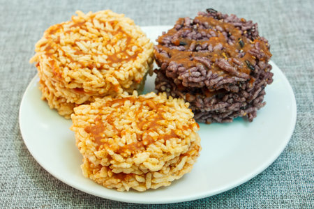 puffed rice with sugar or sweetmeat made of steamed sticky rice, thai snack.の写真素材