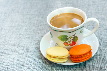 french colorful tasty macaroons and coffee, dessert.の写真素材
