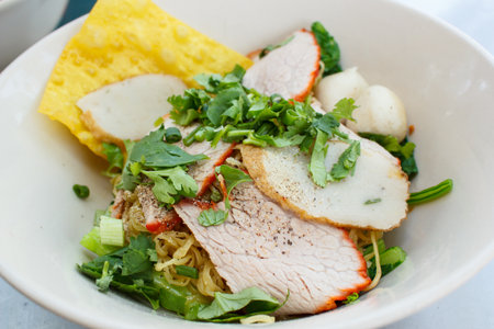 wheat noodles with vegetables and meat, thai style.の写真素材