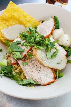 wheat noodles with vegetables and meat, thai style.の写真素材