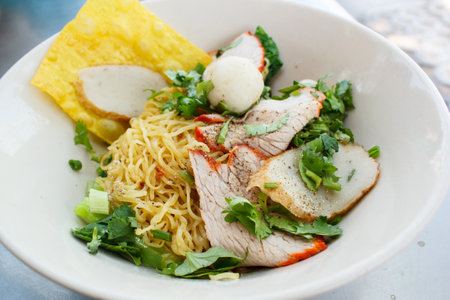 wheat noodles with vegetables and meat, thai style.の写真素材