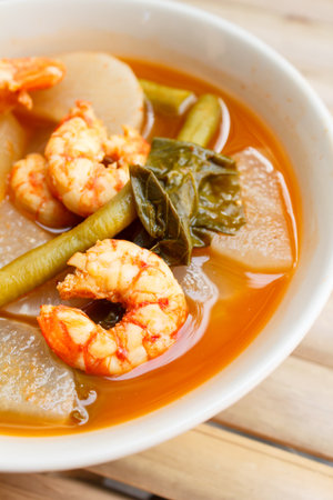 sour soup with shrimp and vegetable, thai food.の写真素材