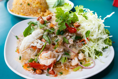 spicy noodle salad, spicy vermicelli salad (yum woon sen), thai salad famous appetizer.の写真素材