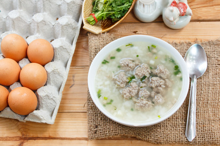 rice porridge with minced pork, thai breakfast.の写真素材