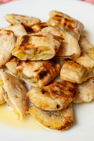 Grilled banana serve with syrup, Thai snack.の写真素材