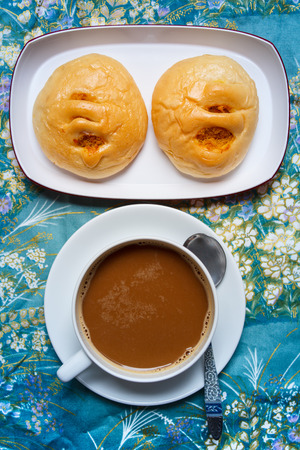 Bread with dried shredded pork, coffee break thai style.の写真素材