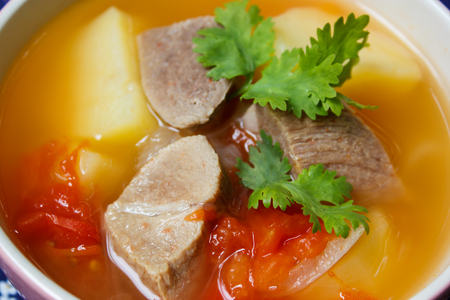 Delicious pork stew soup with vegetables at restaurant.の写真素材