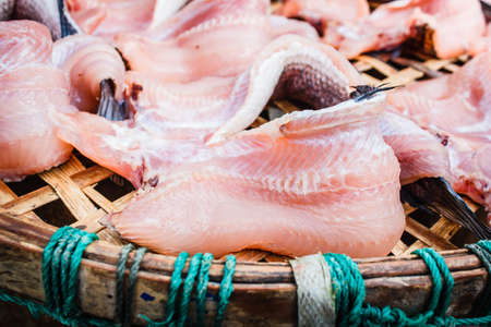 Dry fish on basket bamboo in Thailand.