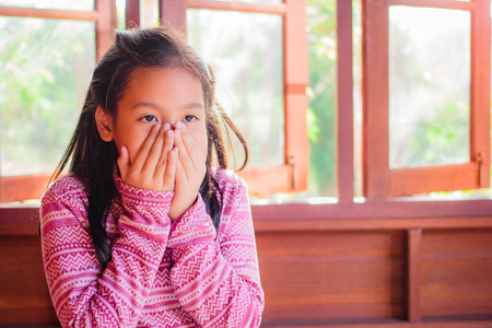 Portrait of pretty teenager girl when the sunlight shines.の写真素材