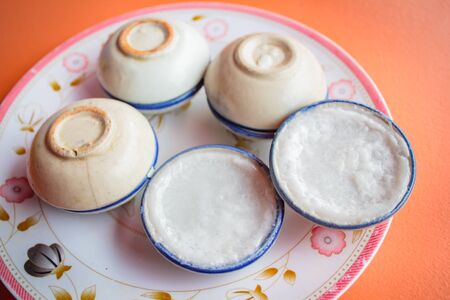 Thai dessert made of coconut milk, pandan leaves and tapioca flour at restaurant.の写真素材